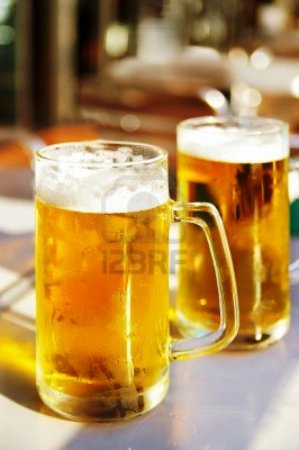 11001796-two-cold-pints-of-beer-at-an-outdoor-cafe.jpg